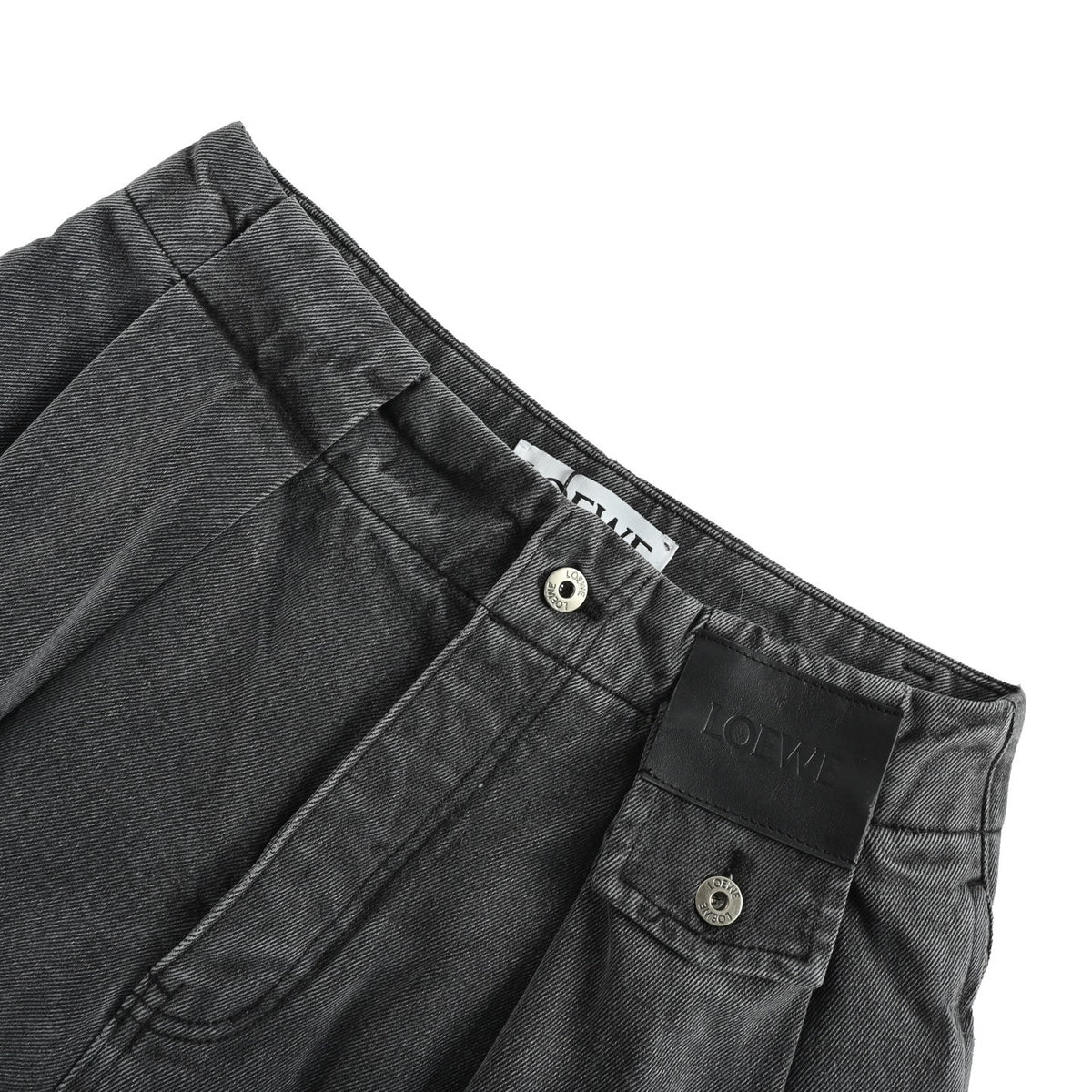 Loewe/Luoyiwei leather patch scimitar jeans