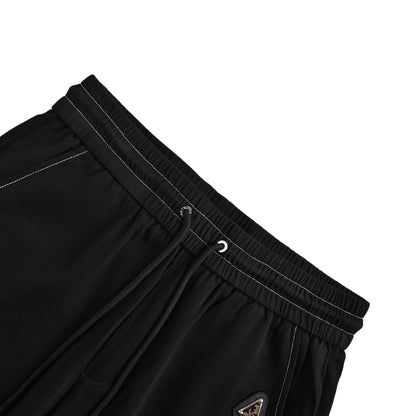 Prada contrasting back pocket flocked triangle trousers