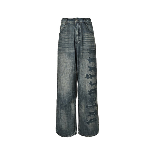 Balenciaga distressed jeans with leg patches