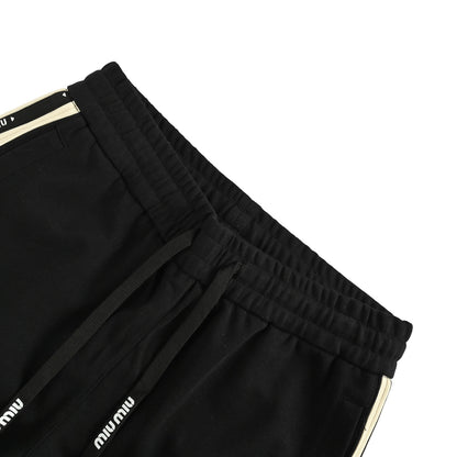 Miu Miu letter web trousers