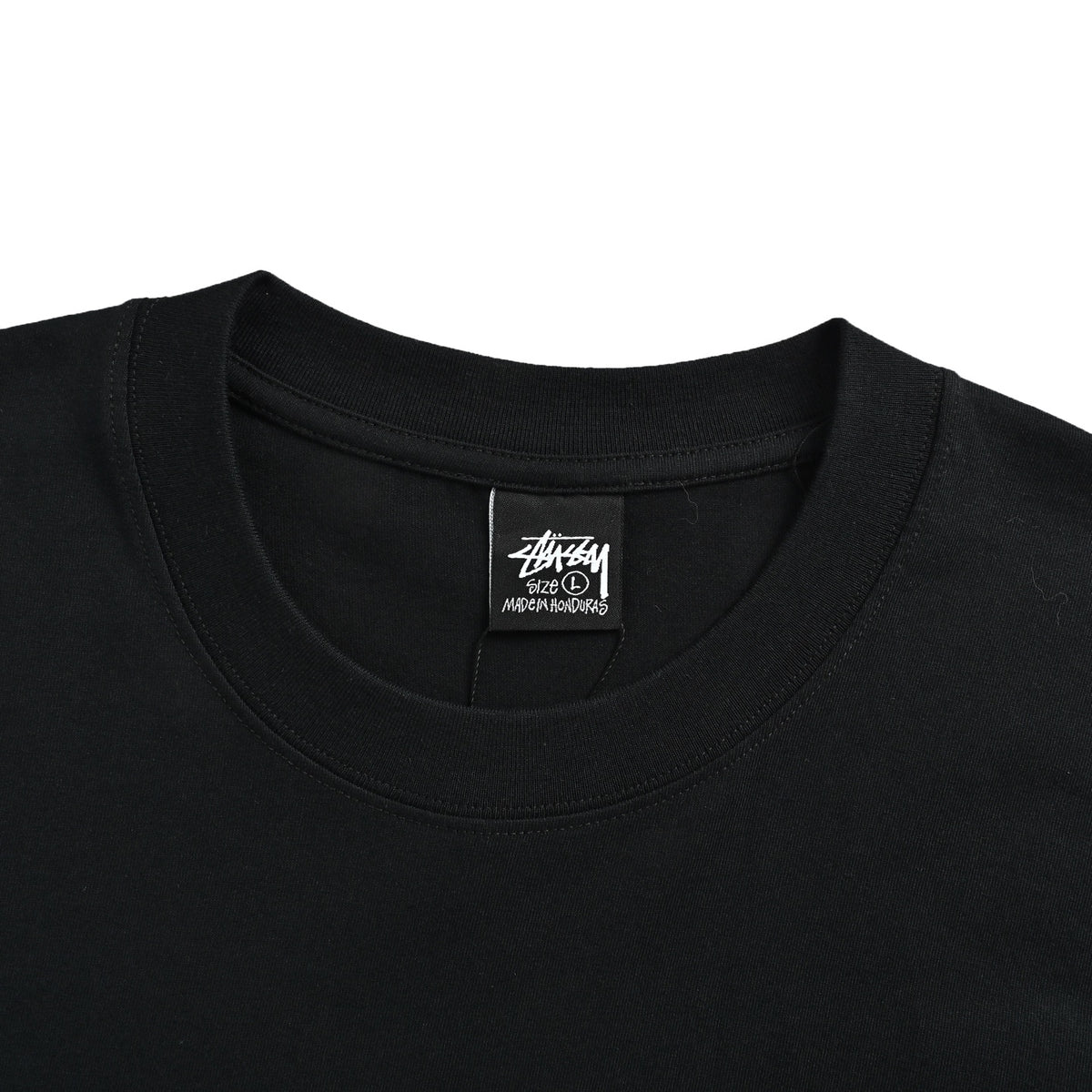 Stussy short sleeves with lettering and slogan printing on the back