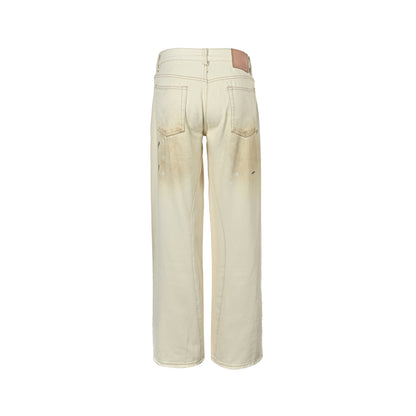 Acne Studios white mud dyed and splashed ink distressed scimitar jeans