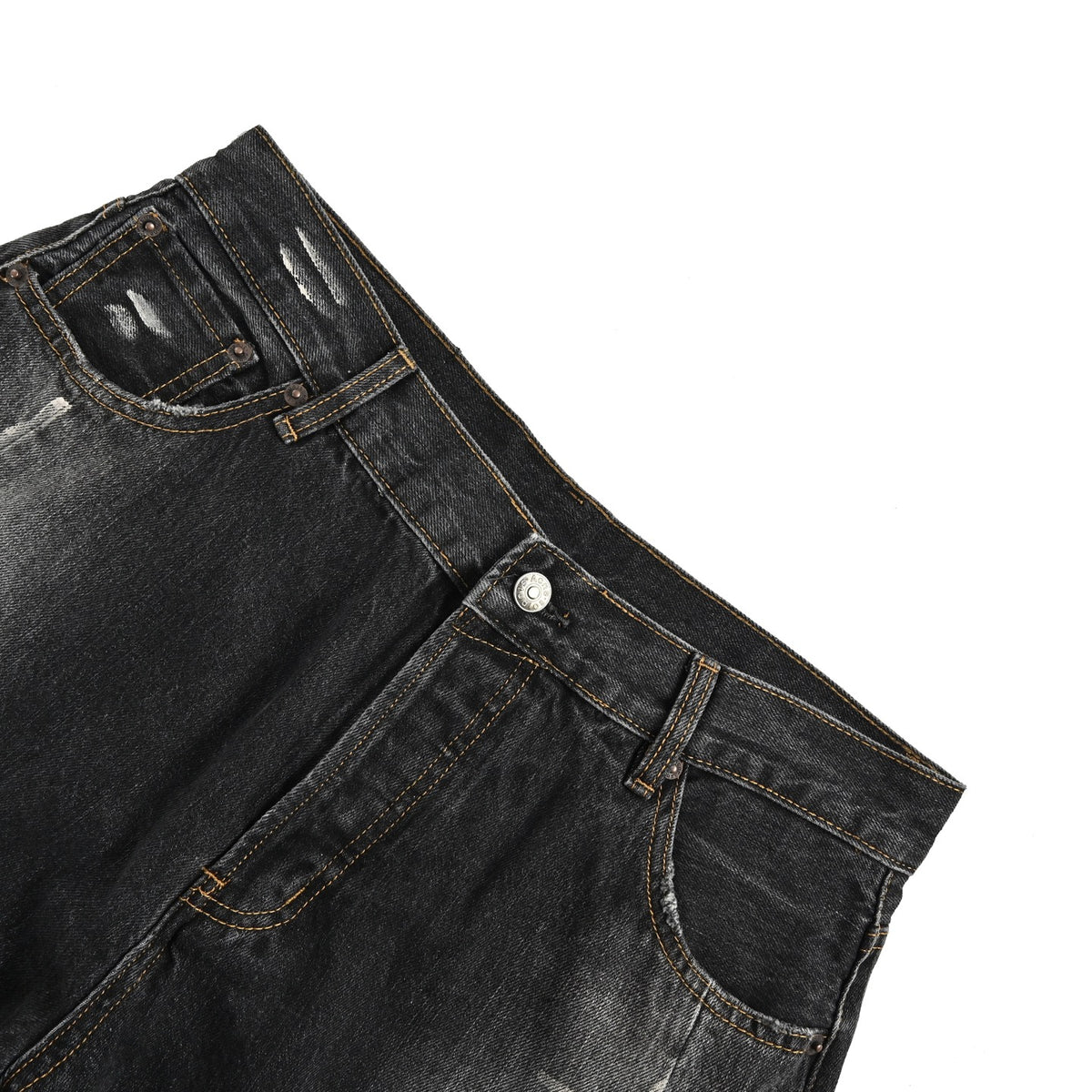 Acne Studios distressed scimitar jeans with splashes of ink
