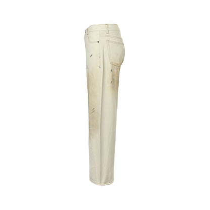 Acne Studios white mud dyed and splashed ink distressed scimitar jeans