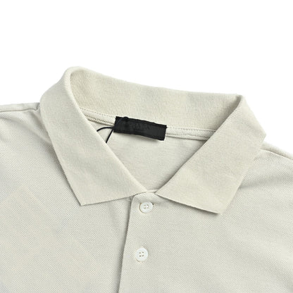 Prada 26ss Polo short sleeves with embroidered chest badge and small label