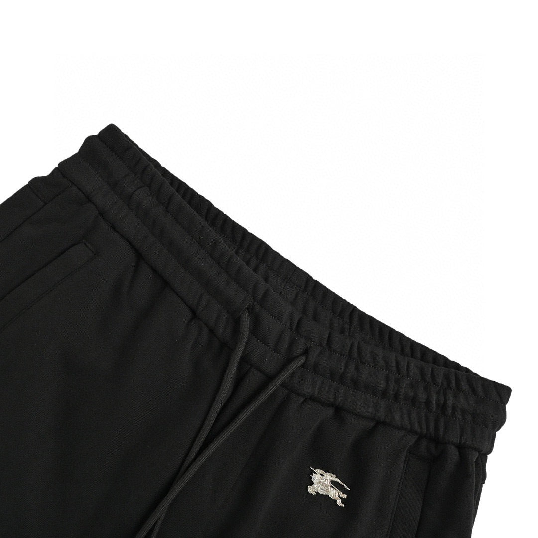 Burberry inlaid metal war horse logo trousers