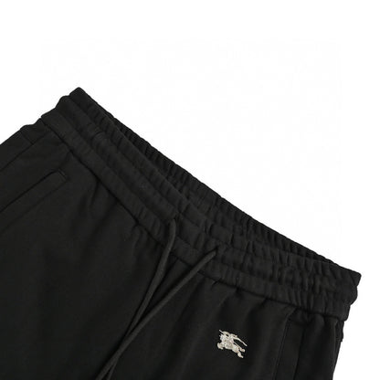 Burberry inlaid metal war horse logo trousers