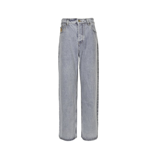 Louis Vuitton leather label pocket faded denim jeans