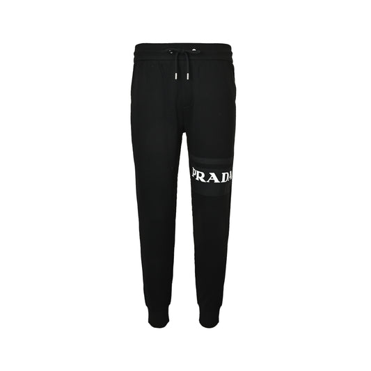 Prada letter-stitched back pocket red tape trousers