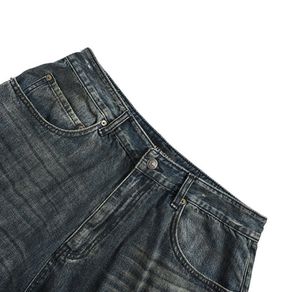 Balenciaga distressed jeans with leg patches