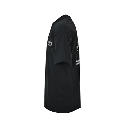 Stussy short sleeves with lettering and slogan printing on the back