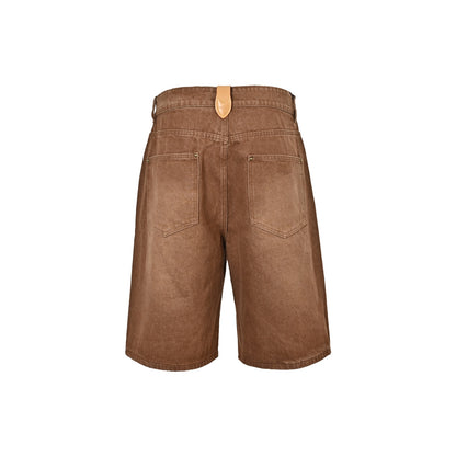 Louis Vuitton washed wide-leg denim shorts with leather label on the back waist