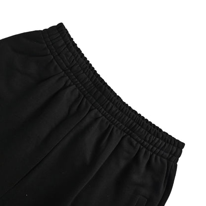 We11 Done logo pattern elastic waist shorts