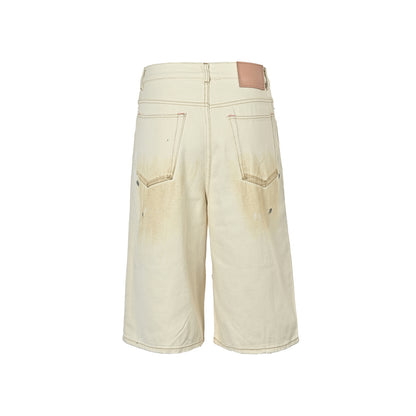 Acne Studios white mud-dyed splash-ink distressed cropped denim shorts