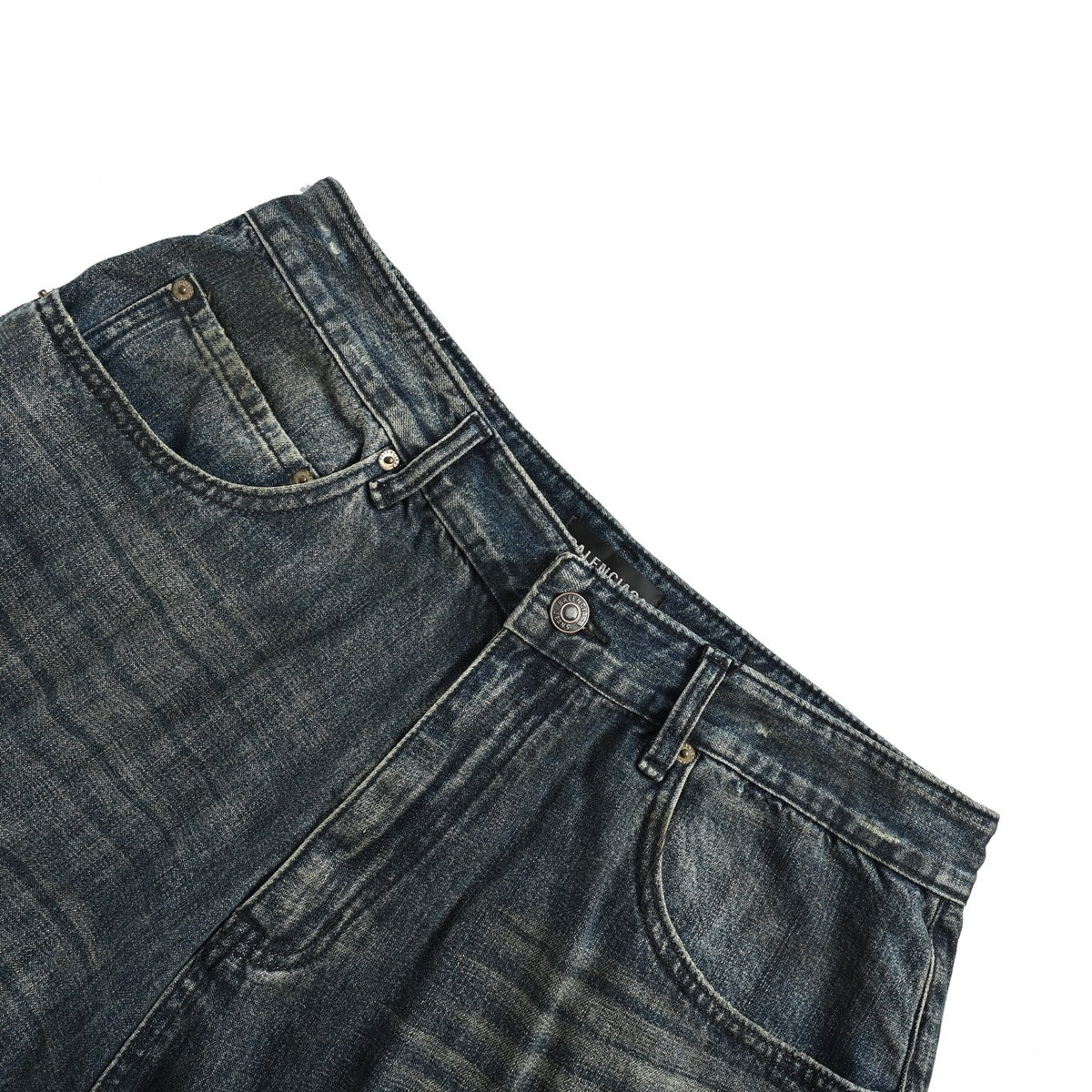 Balenciaga distressed jeans with leg patches