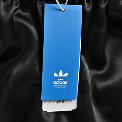 Adidas polka dot three stripes webbing trousers