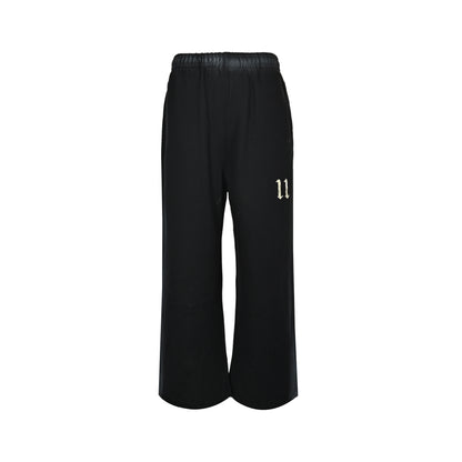We11 Done colorful spray-edged washed wide-leg trousers