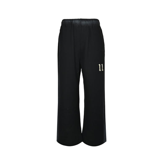 We11 Done colorful spray-edged washed wide-leg trousers